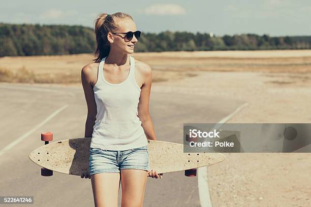 Teenage Girl With Skateboard Stock Photo - Download Image Now - Women, Skateboarding, City Of Los Angeles