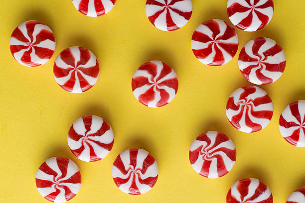 istock Candies colorful mix on yellow bright background with copy space 522641280