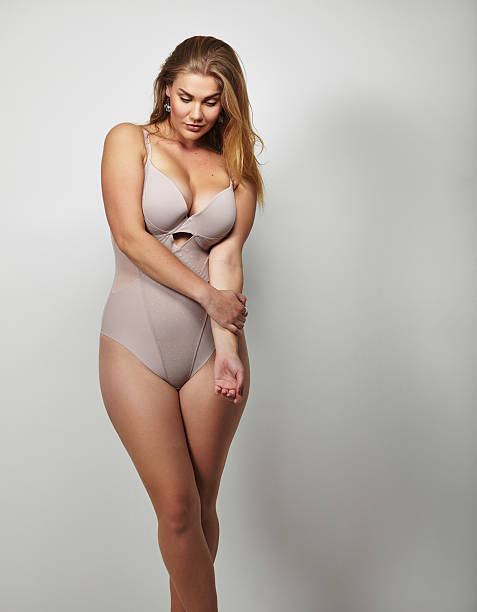istock Attractive plus size young lady in body stocking 522645259