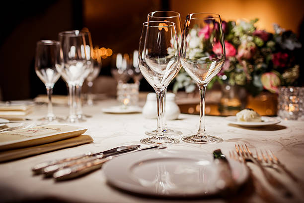Empty glasses in restaurant Empty glasses in restaurant. Table setting for celebration banquet stock pictures, royalty-free photos & images