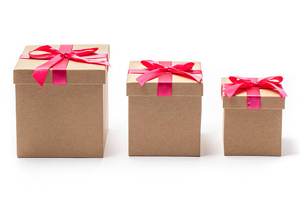 Three Closed Present Boxes in Different Sizes stock photo