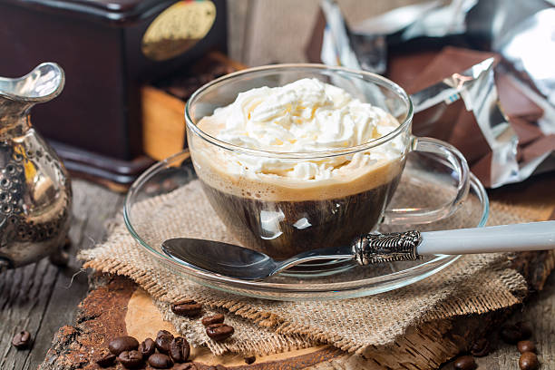 istock Glass cup of coffee with cream 522649458
