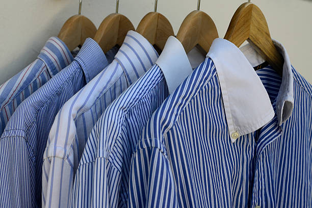 istock Shirts on wooden hangers 522650619