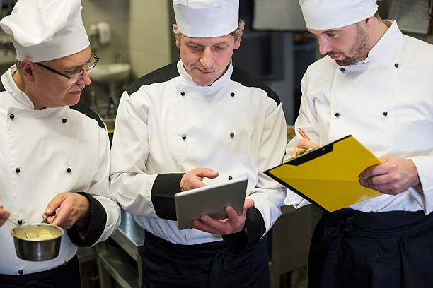 istock Consultation of chefs in the kitchen 522650986