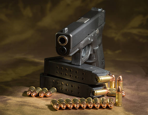 HandGun 9mm HandGun sport and security number 17 stock pictures, royalty-free photos & images