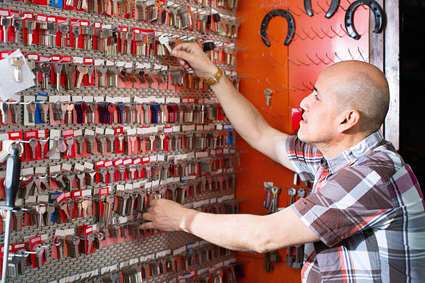 istock Mature professional hanging new key on stand 522651120