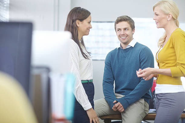 istock Getting the news from the office grapevine 522672117