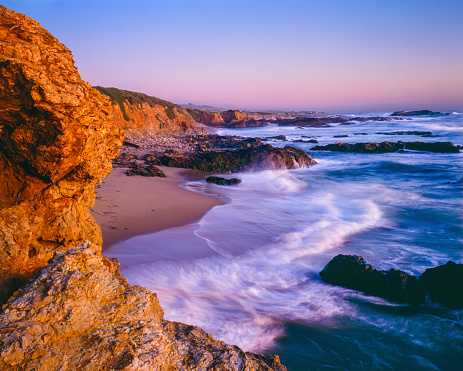 Pescadero State Beach with surf at dusk south of San Fransico, CA