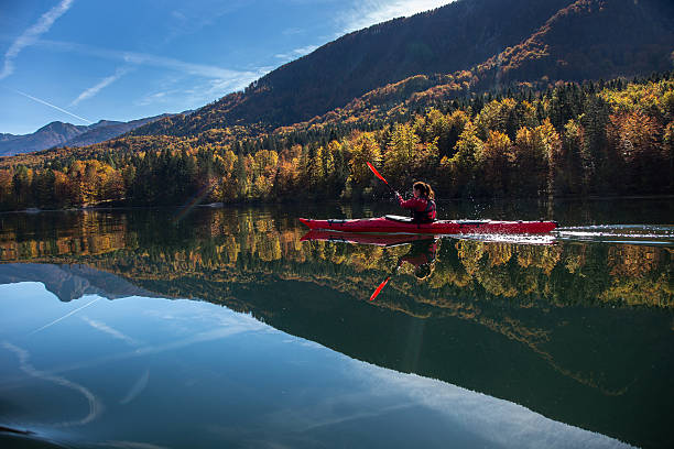 istock Sea kayaking on a calm lake 522673117