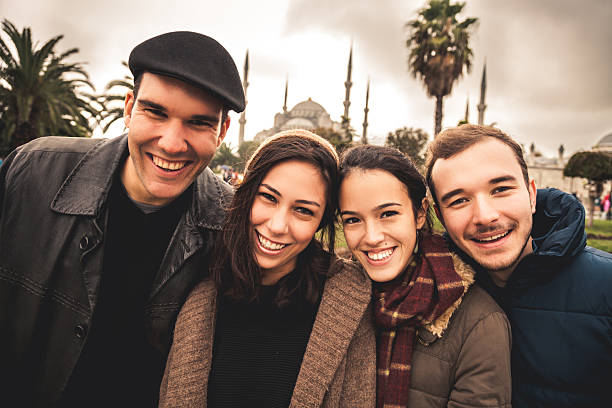 istock Group of happy friends taking a selfie 522673283