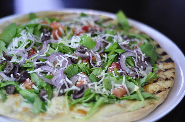 istock Close-Up of Arugula Salad Pizza 522673991