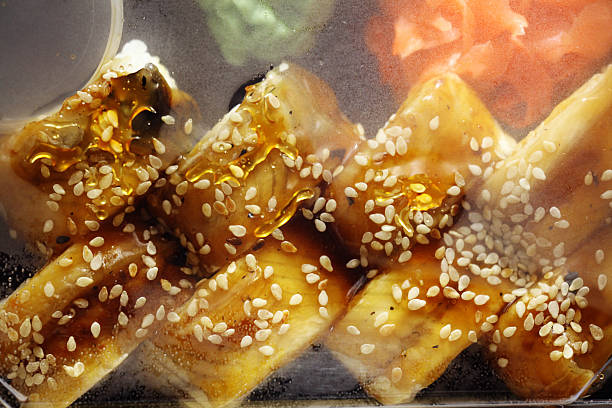 delivery service Japanese food rolls in plastic box
