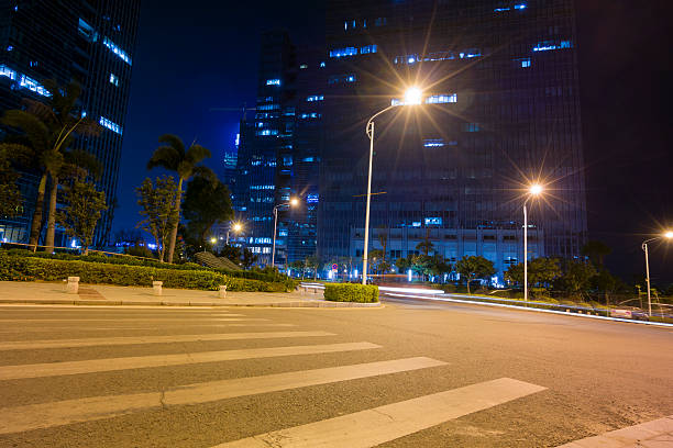 istock Road and modern building at night 522676653