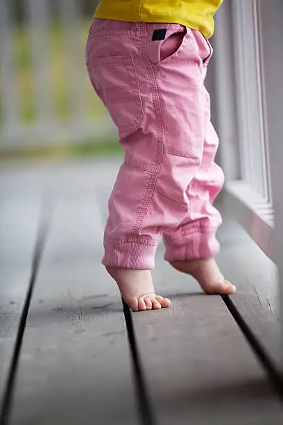 Photo of Little girl reaching up