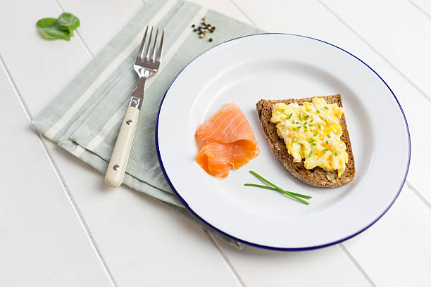 istock Healthy breakfast with scrambled eggs on toast 522691057