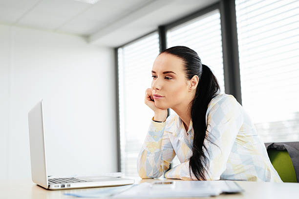 istock Young female office worker at office 522691709