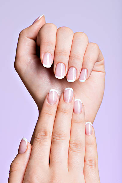 istock Beautiful woman's hands with beautiful  nails 522692411