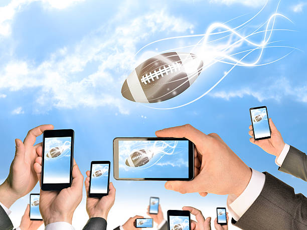 istock Hands holding smart phones and shoot video as falling American 522694625