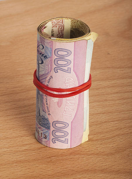 istock roll of money 522696335