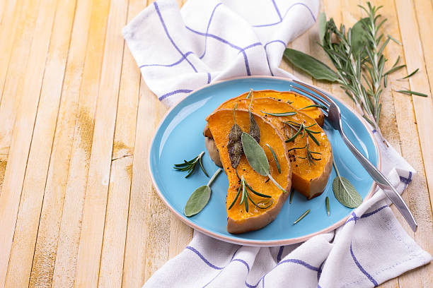 istock Baked pumpkin with herbs and spices 522696855
