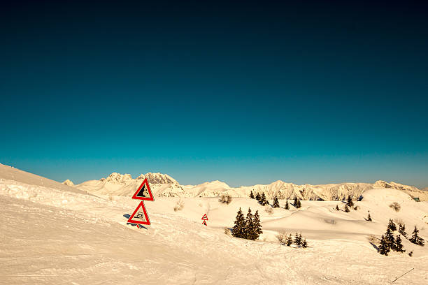 istock road signal buried by the snow 522711399