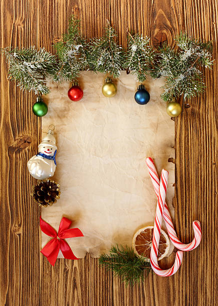 istock Christmas decorations on the old sheet of paper 522711519