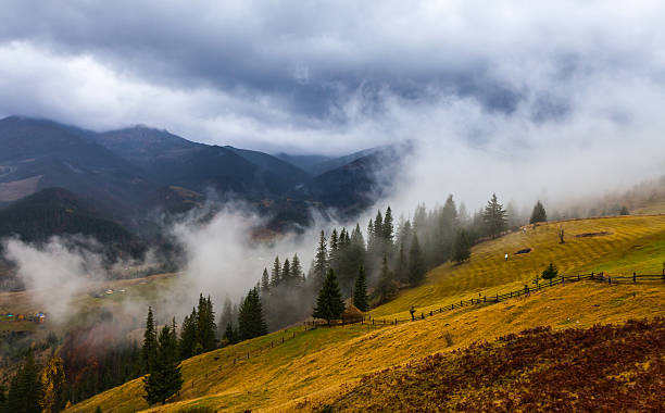 istock global warming. mountain landscape. Clouds and fog 522712001