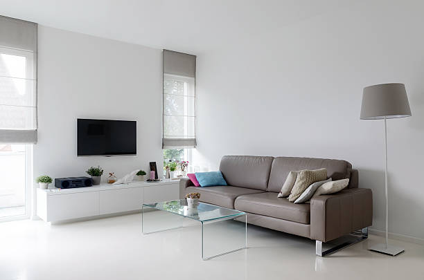 istock White living room with taupe sofa 522712479