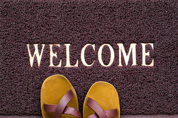 istock Welcome carpet with beach shales on it 522712553