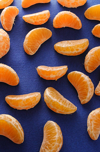 tangerine rebanadas - orange portion fruit citrus fruit fotografías e imágenes de stock