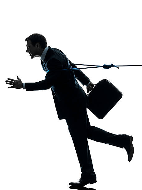 istock business man catched by lasso rope silhouette 522715015