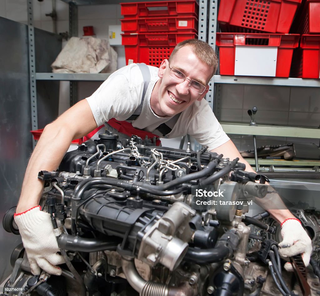 auto mechanic Adjusting Stock Photo