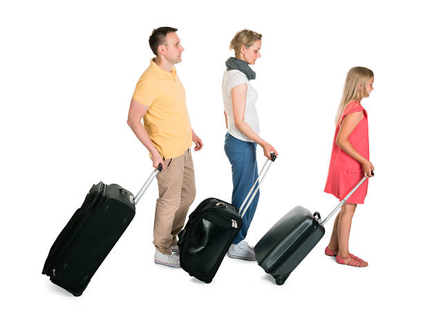 istock Young Family Walking With Luggage 522716217