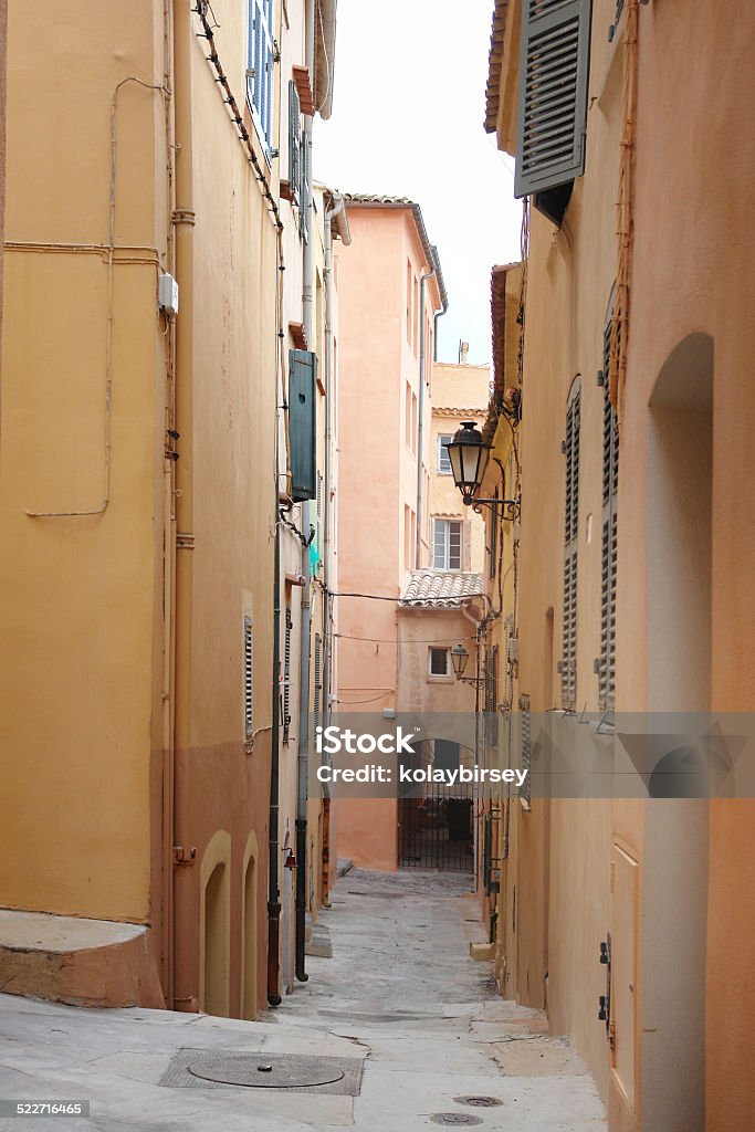 Narrow Street in Ancient Town Alley Stock Photo