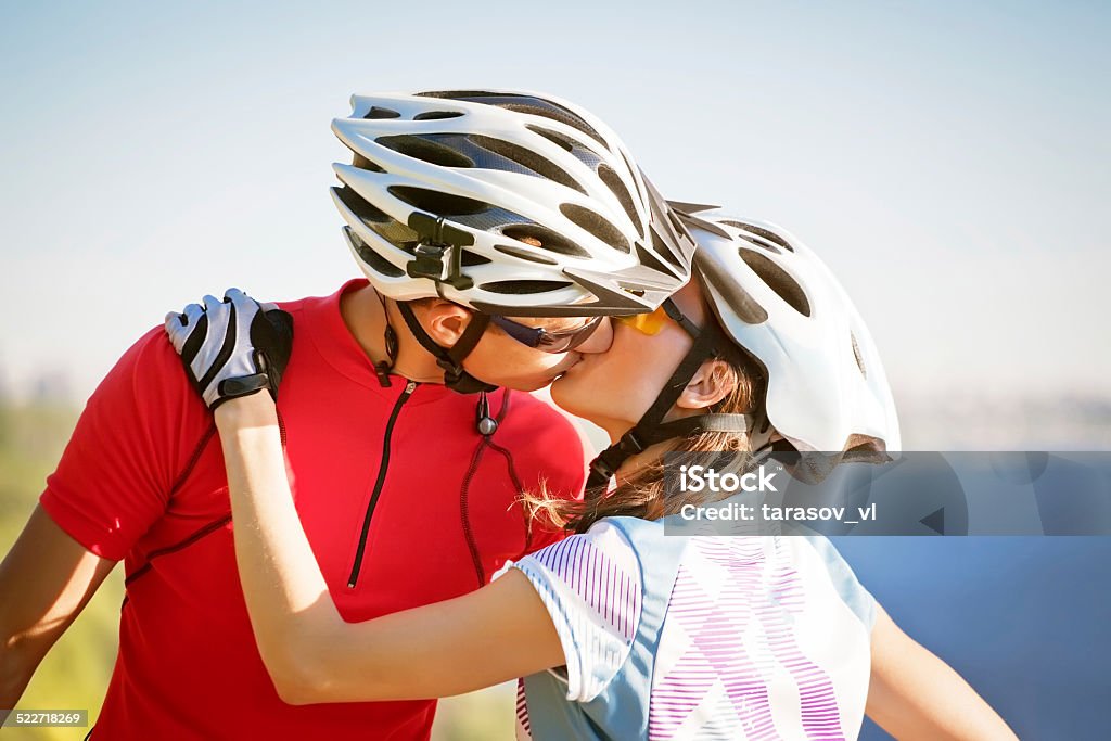 happy couple on bicycles Adult Stock Photo