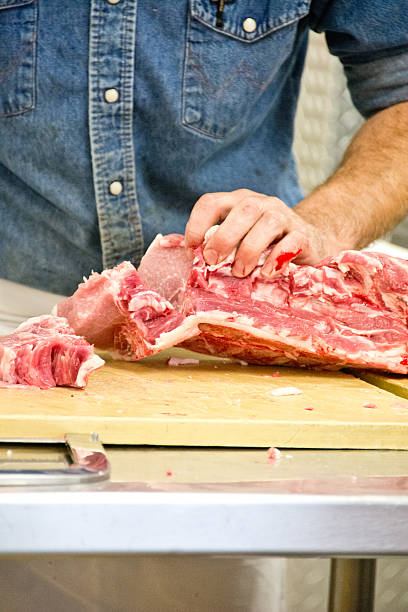 Butcher with bloody finger