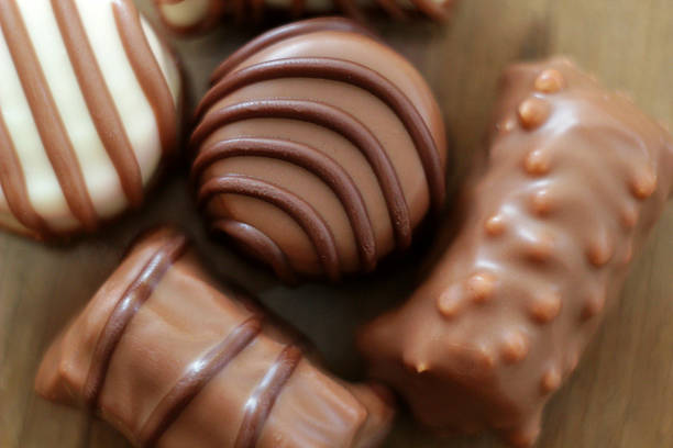 istock Chocolate dessert candies close up top view 522725792
