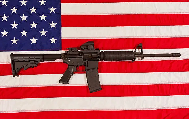 AR15 M4A1 M16 Style Weapon Automatic Rifle with USA Flag concept freedom justice patriotism