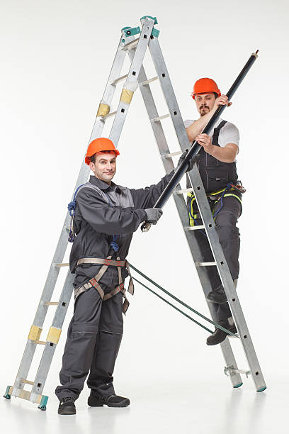 Two handymen at work stair stock photo