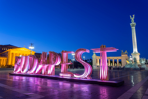 Hero's Square in Budapest with BUDAPEST sign during the Spring Festival at night. (no people)