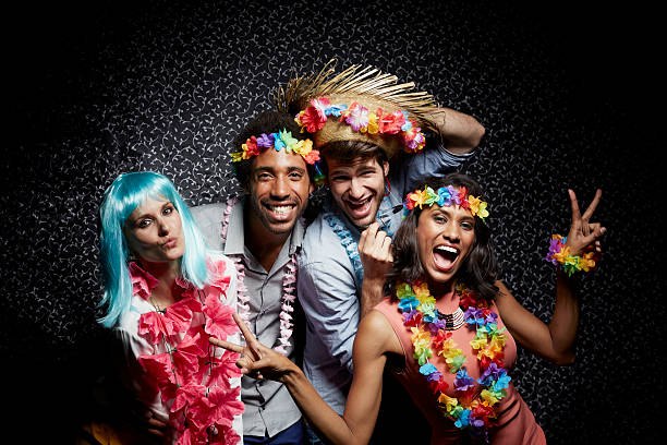 excited friends wearing garlands in nightclub - 2861 ストックフォトと画像