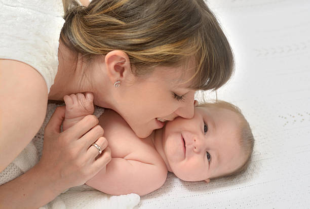 istock happy mother with baby 522733875