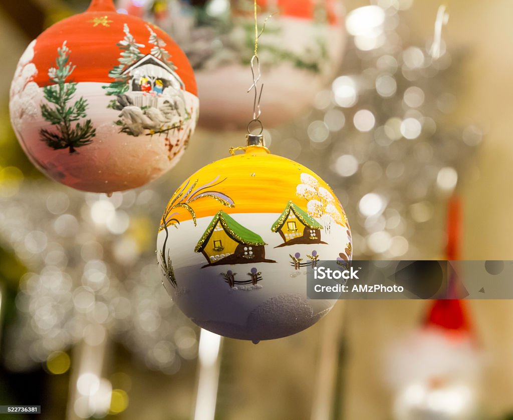 Winter Landscape with a yellow Sky Two different Christmas ornaments, depicting winter landscapes Stuttgart Stock Photo