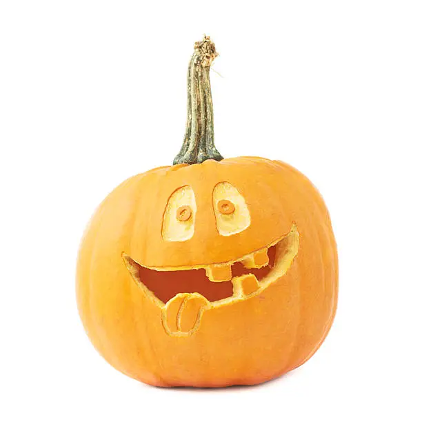 Jack-o'-lanterns orange halloween pumpkin head with the happy smiling facial expression carved on it, isolated over the white background