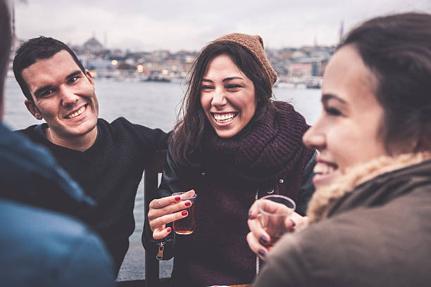 istock Happy friends drinking tea in a cafe 522739597