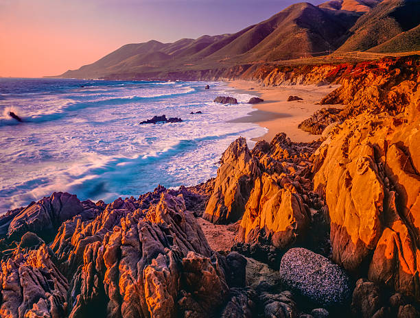 Big Sur sunset seascape of California coastline,rocky,beach (P) Rocky shoreline of Big Sur coastline south of Carmel, California big sur stock pictures, royalty-free photos & images