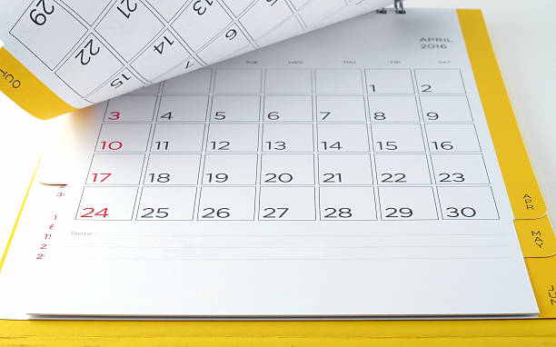 desk calendar with days and dates in April 2016