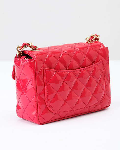 istock Pink glossy leather women bag 522743740