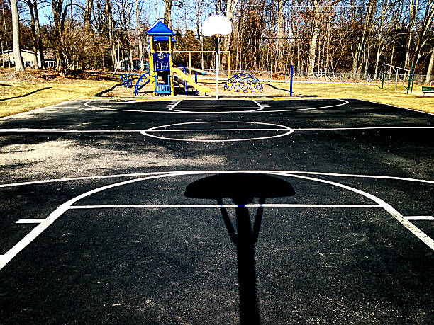 istock Basketball court with playground 522745236