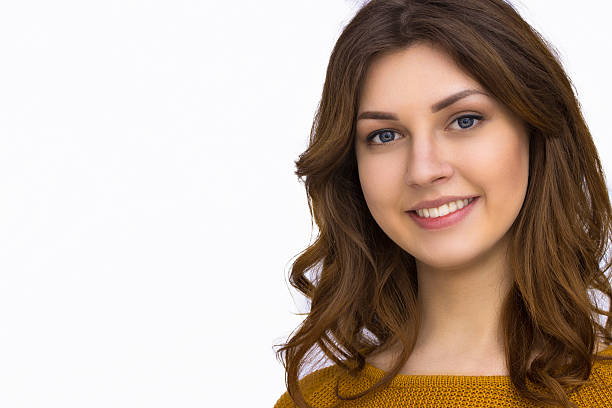 istock Pretty girl in orange sweater 522745922